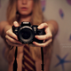 Illustration for article titled Fetish: 50 Mirror Self Portraits with Cameras In Sight